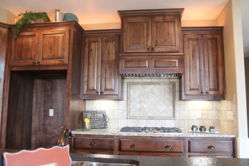 THE CHADRICK - 1 1/2 STORY - CUSTOM CABNETRY by PRO BUILDERS